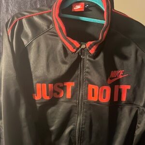Nike Red and Black Lightweight Jacket with Bold Slogan